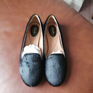 Classy Clarks black flats